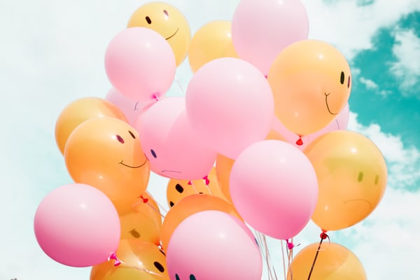 Balloons with happy faces