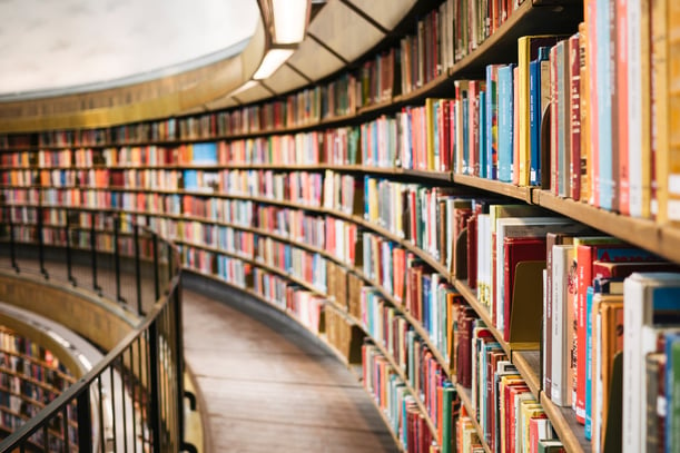 Books on shelfs on library