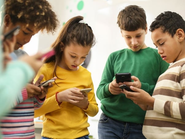 Kids playing on phones