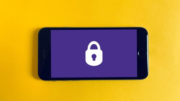 Lock on purple background