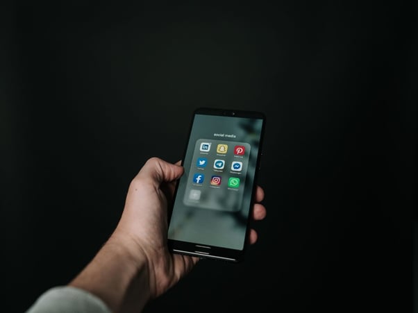 Social media icons on black phone