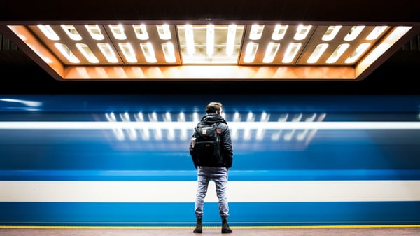 Man standing on subway