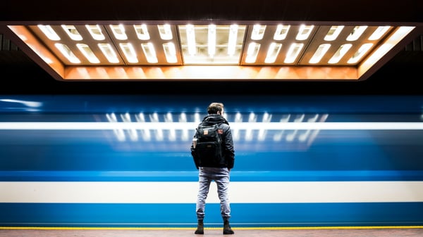 Man standing on subway