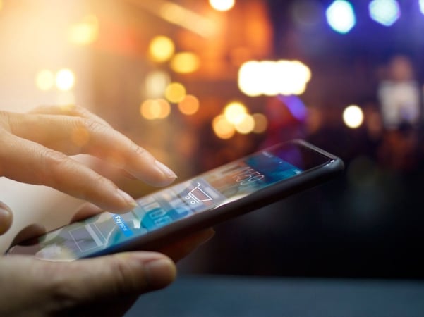 Man using a black mobile