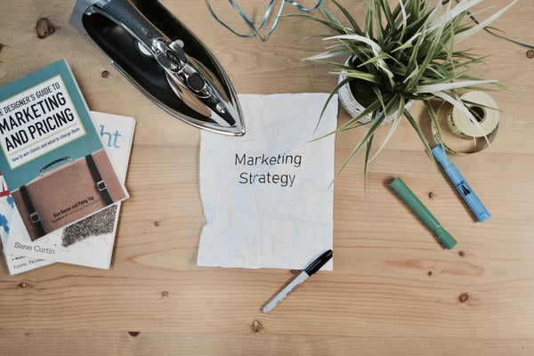 Marketing strategy written on white paper
