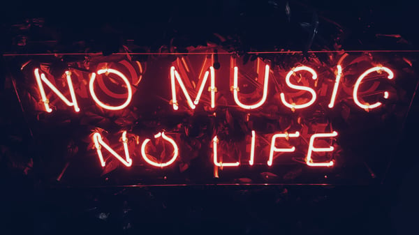 Neon sign reading "no music, no life"