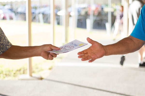 Person holding flyer