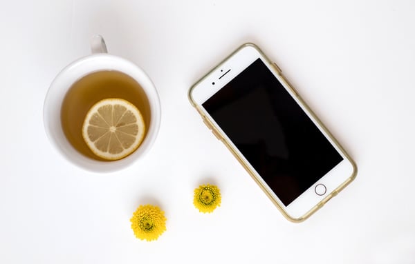 Phone next to tea