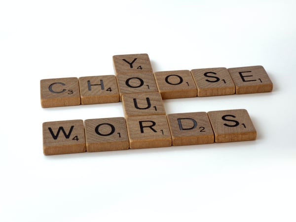 "Choose your words" written in game tiles