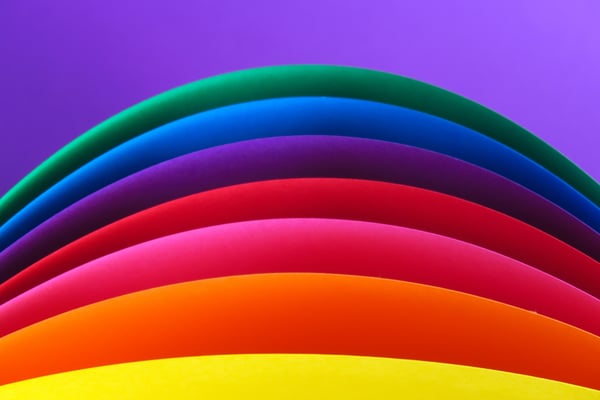 Rainbow tubes on purple background