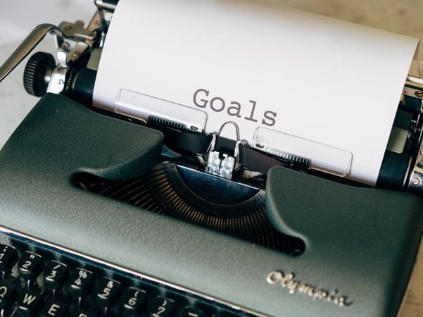 The word Goals writting on a white paper