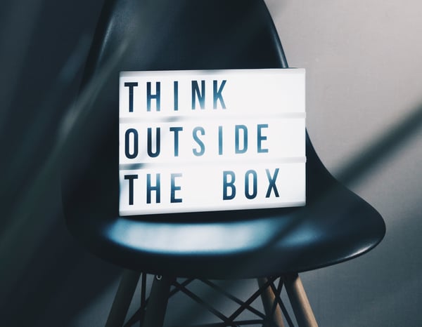 "Think outside the box" sign