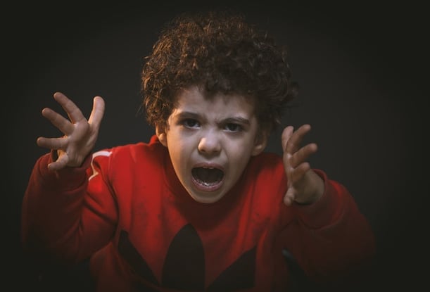 Toddler with red sweater