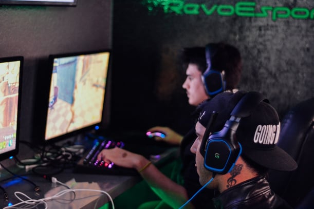 Two men playing PC games
