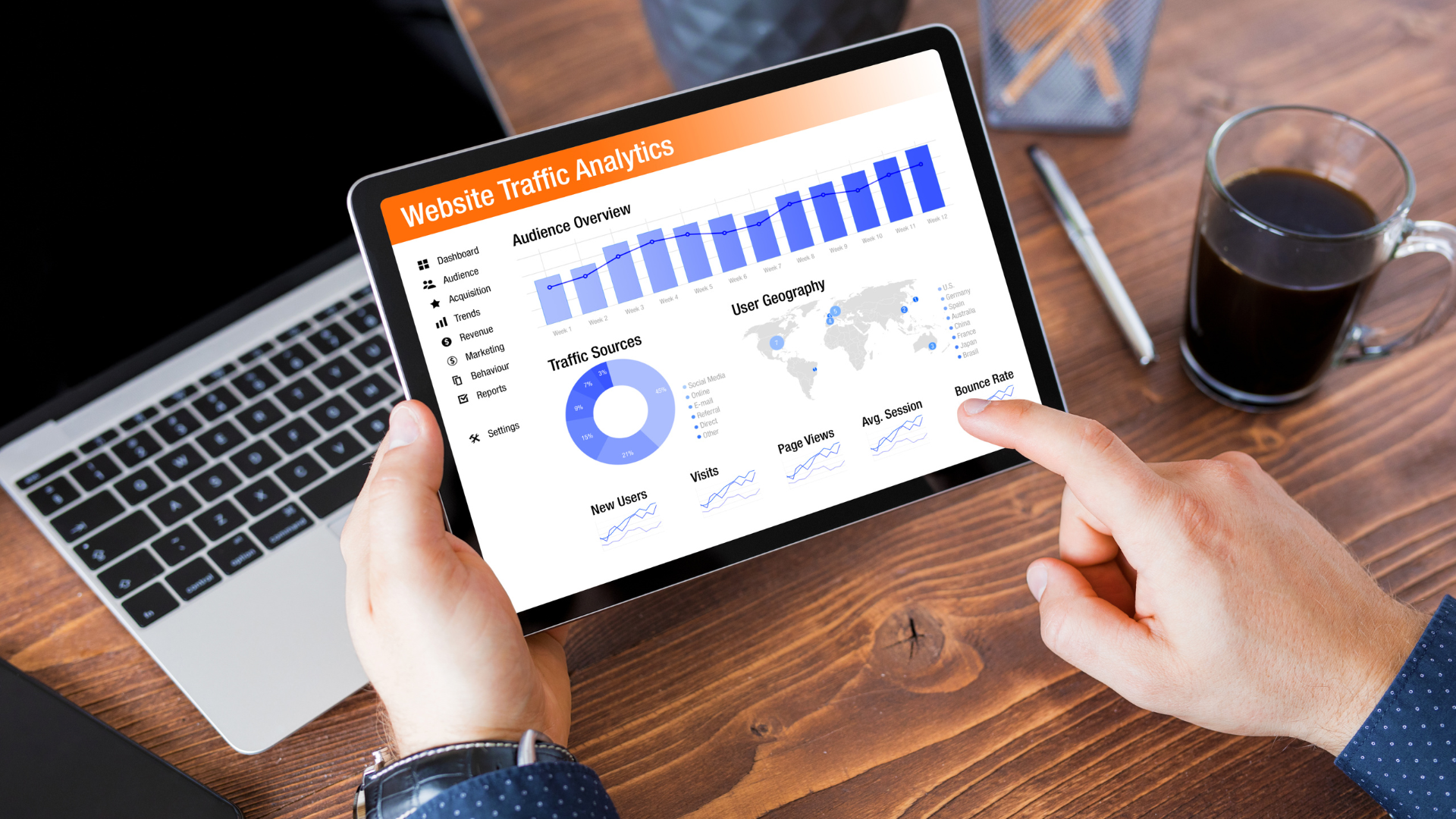 Person looking at web traffic analytics on a tablet 