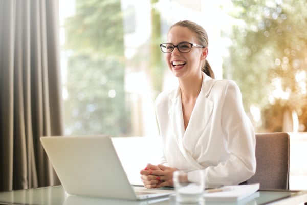 Woman sitting at computer