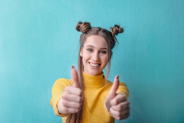 Woman wearing yellow turtleneck sweater1