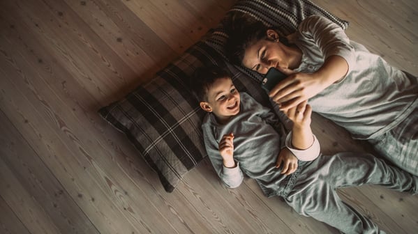 mom and son on floor