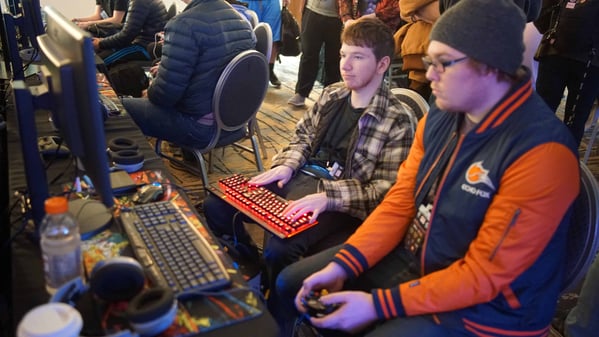 People sitting at gaming computers