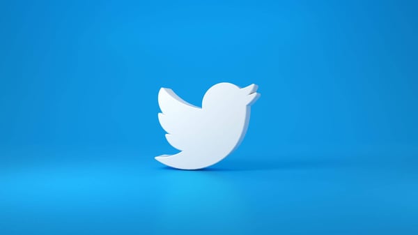 twitter logo on blue background (1)